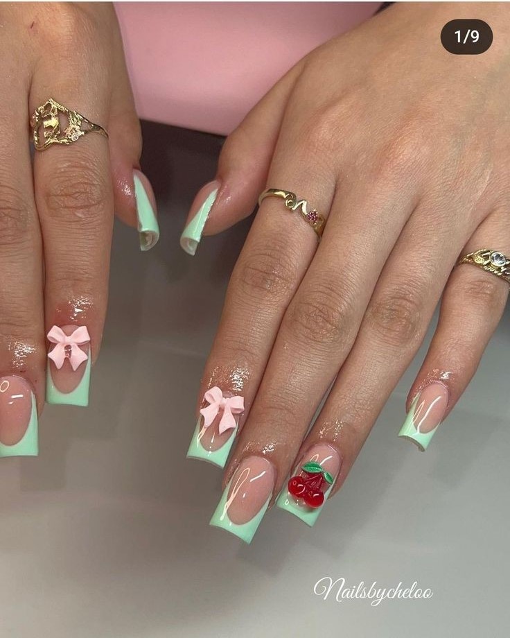 green tips coffin nails with cherry designs
