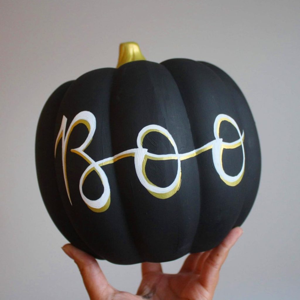 painted pumpkins with words