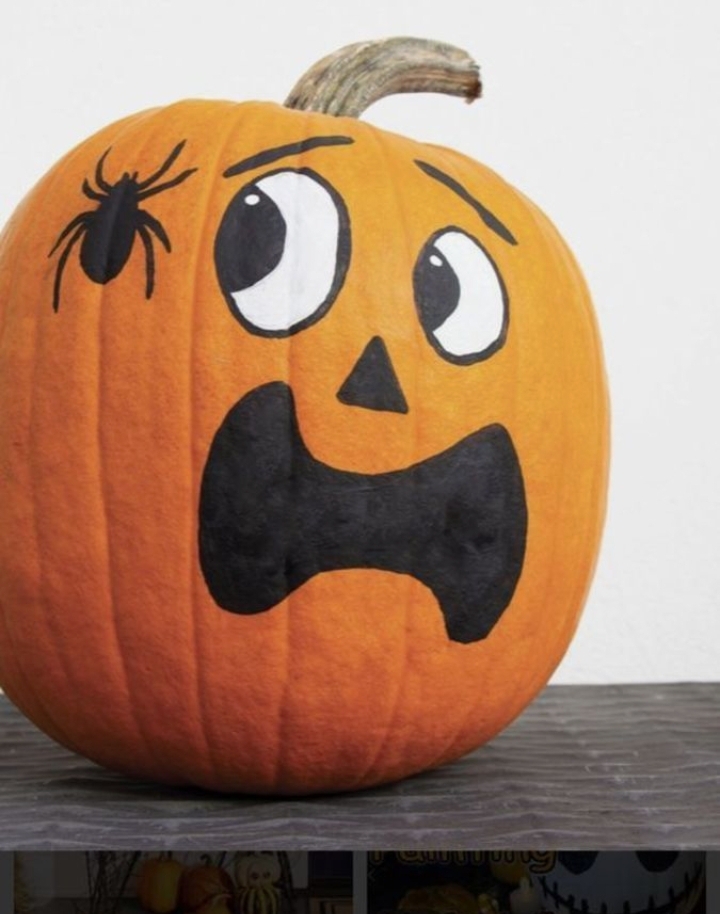 pumpkin painted as scared of spider