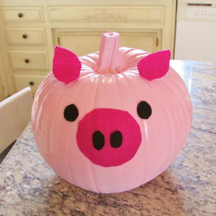 pumpkin painted as a pink pig