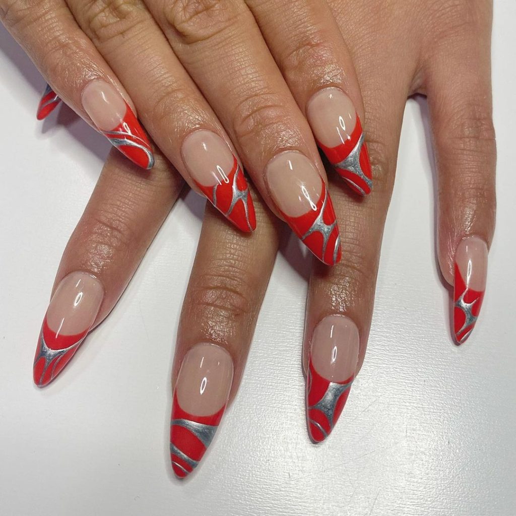 red nails design stilettoes