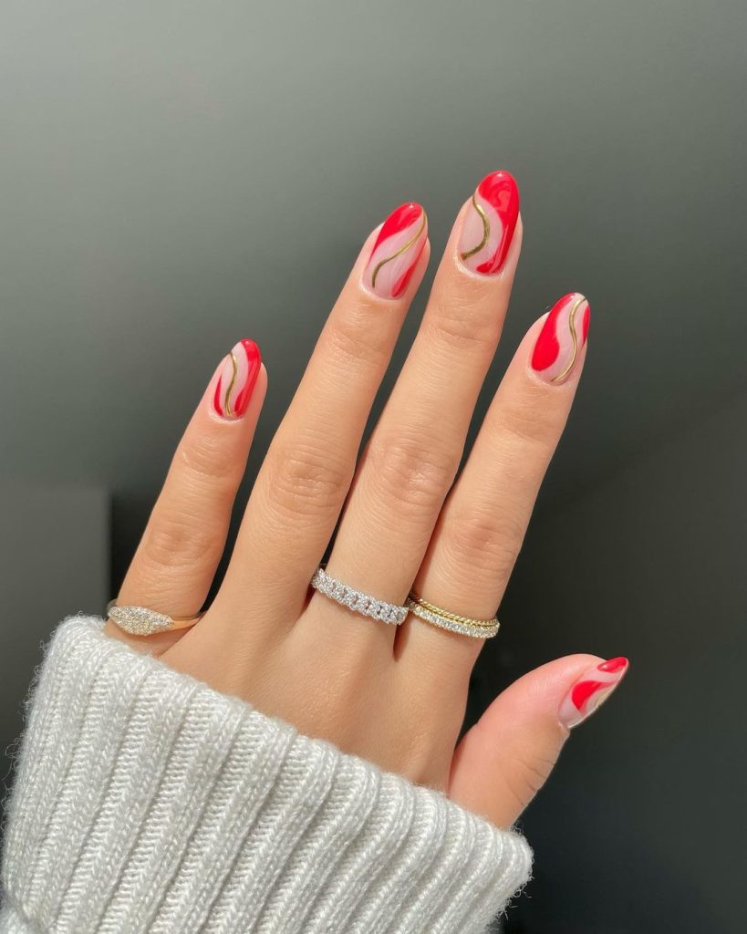 red swirly nails design almond