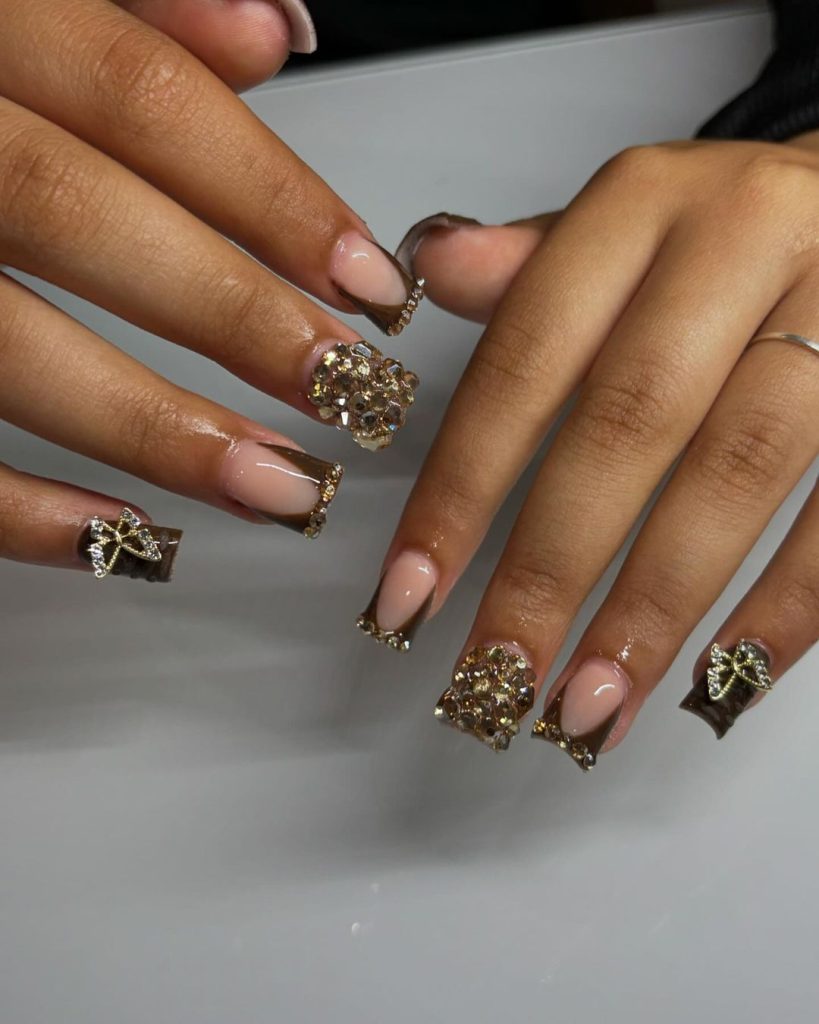 brown and gold nails with rhinestones