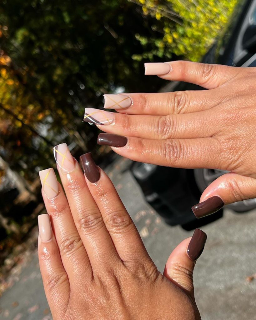 coffin brown and gold nails