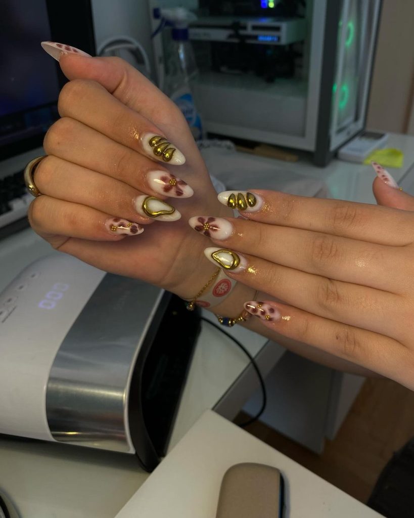 aura brown and gold nails