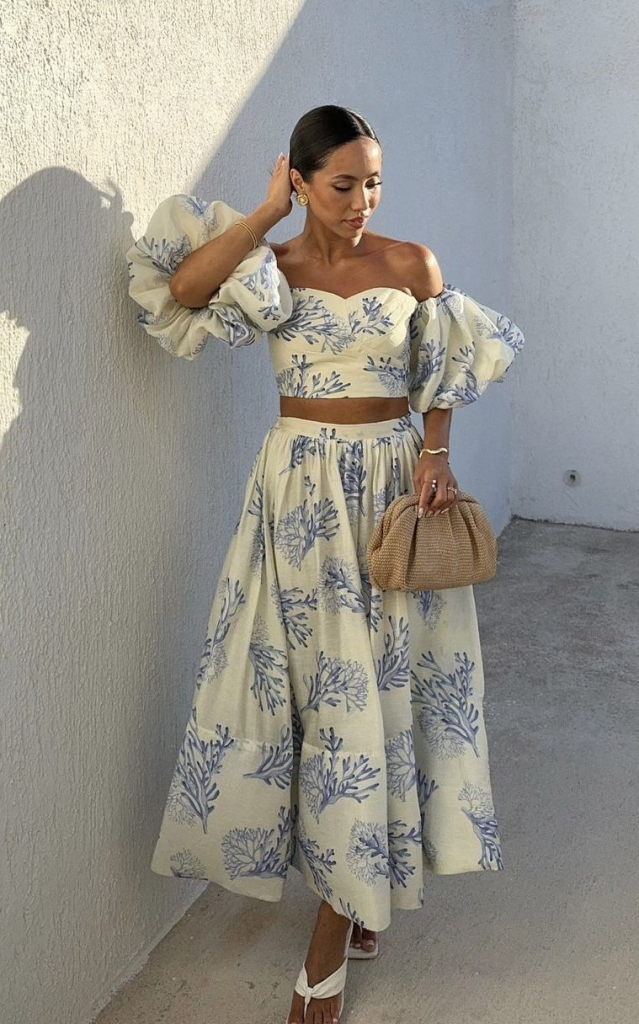 A matching two-piece linen set that has a blue and white botanical print